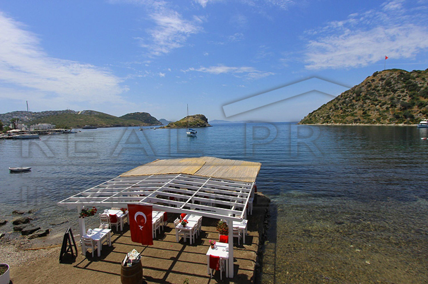 Eşsiz teklif Gümüşlük Bodrum�da Satılık DENIZE SIFIR muhteşem taş ev